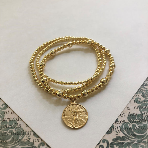 Gold Stacking Bead Bracelets with Jesus or Michael