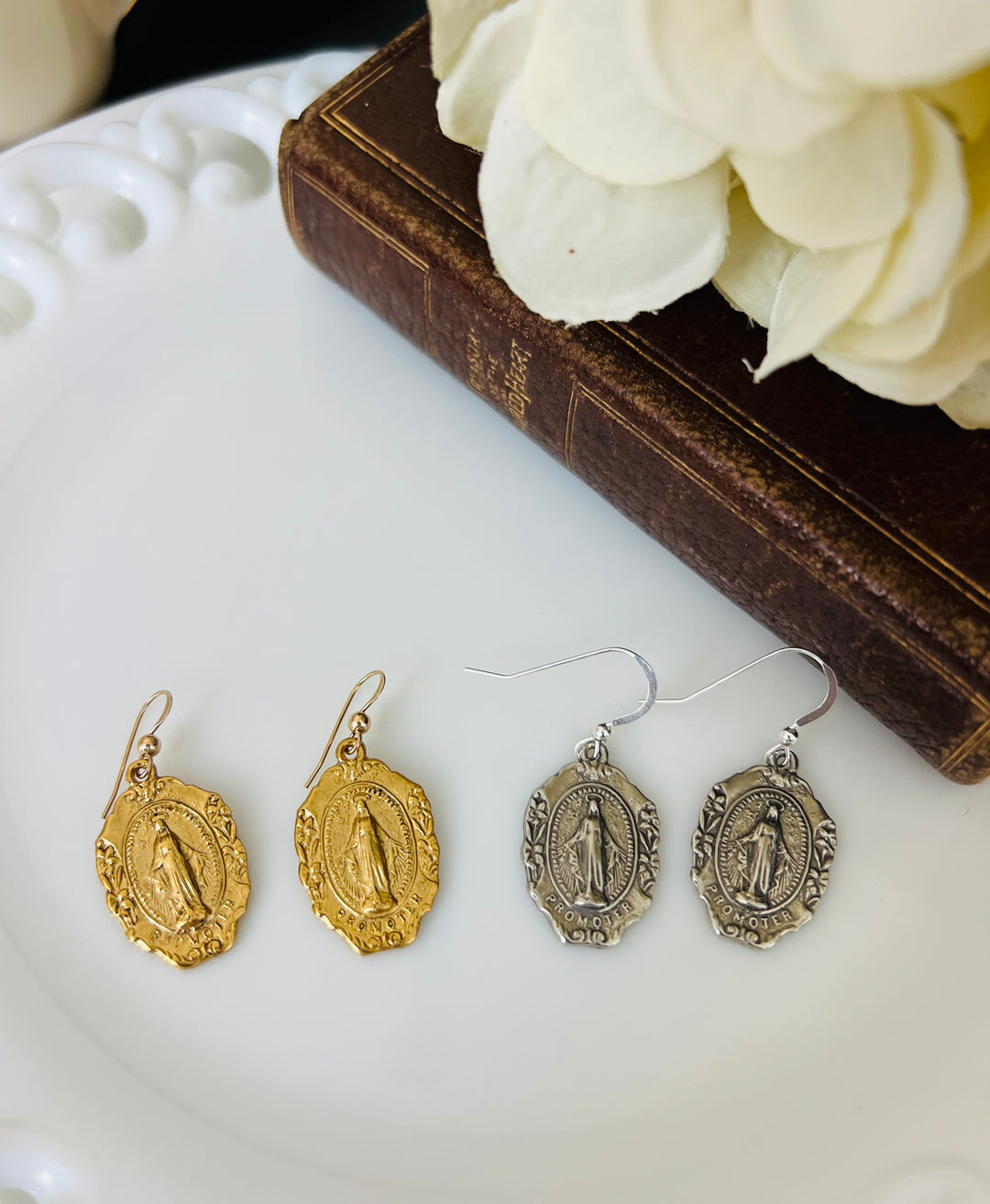 Ornate Miraculous Mary earrings