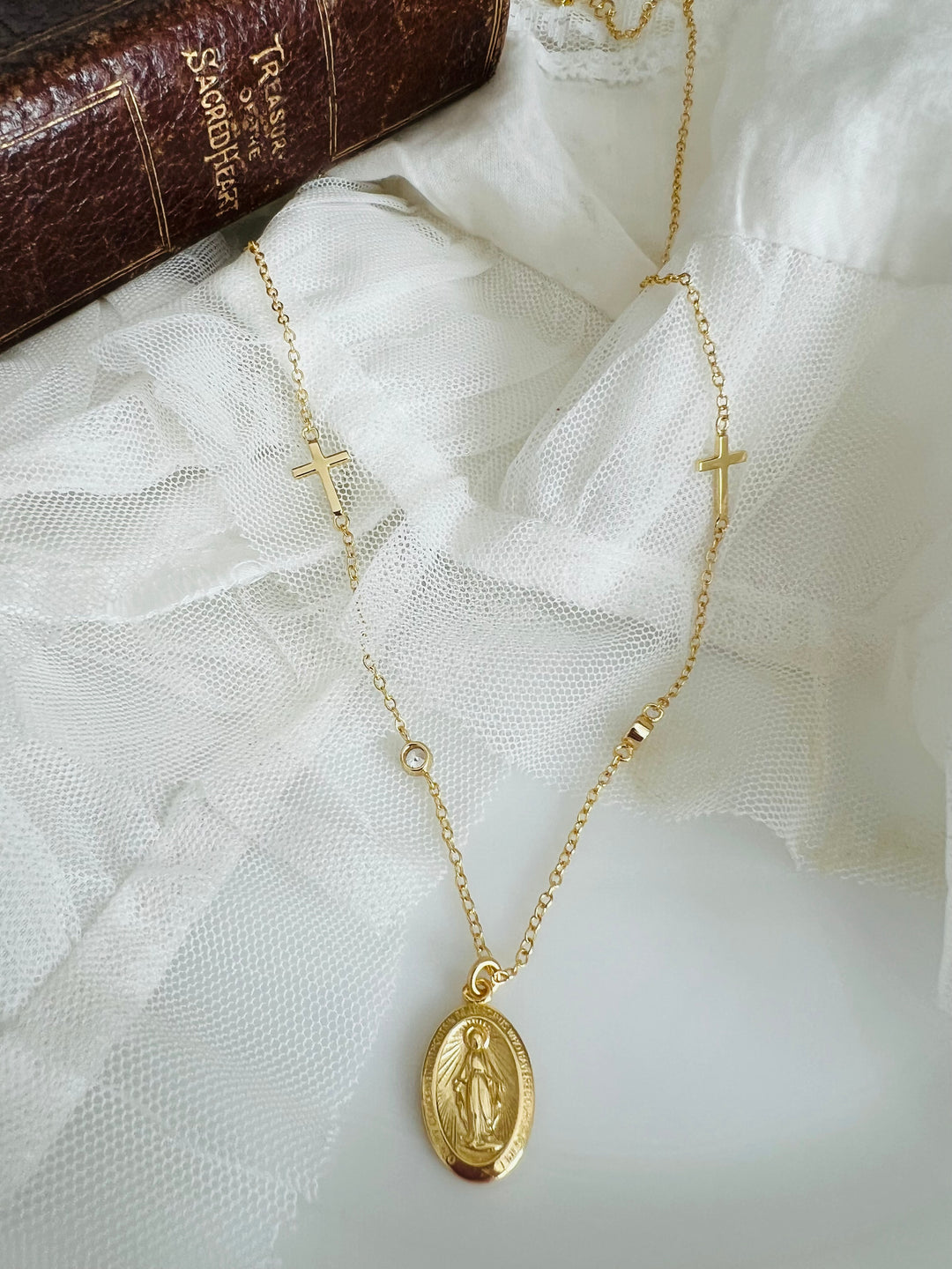 Trisha - adorned with the Cross and Mary